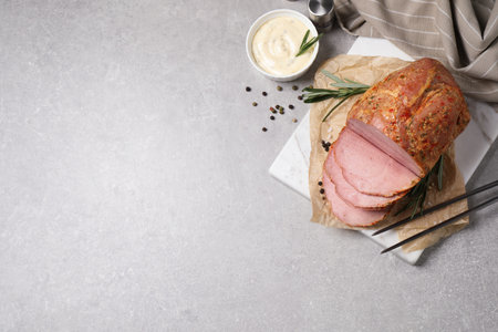 Delicious ham served on gray table, flat lay. Space for textの写真素材