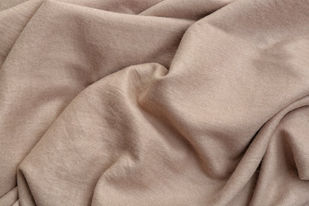 Light brown cloth as background, closeup view