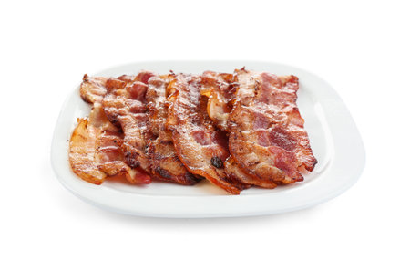 Slices of tasty fried bacon on white backgroundの写真素材