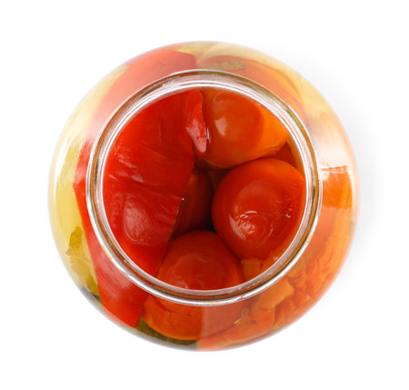 Open jar with pickled tomatoes on white background, top viewの写真素材
