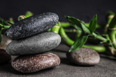 Composition with stones and bamboo on table. Zen conceptの写真素材