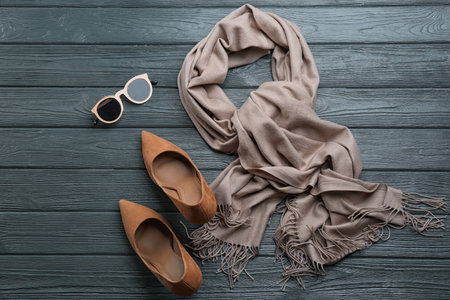 Flat lay composition with clothes on dark wooden backgroundの写真素材