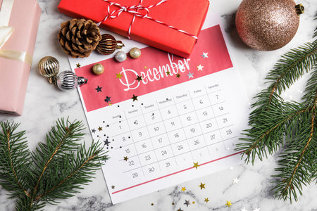 Flat lay composition with paper calendar on white marble tableの写真素材