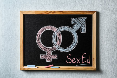Gender symbols and text "SEX ED" written on small blackboardの写真素材