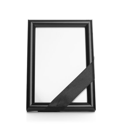 Funeral photo frame with black ribbon on white background. space for designの写真素材