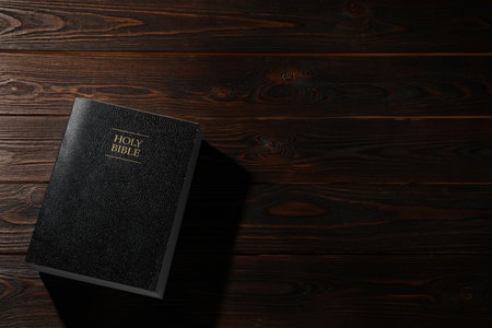 Bible on wooden table, top view with space for text. Christian religious bookの写真素材
