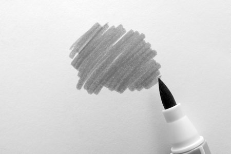 Stroke drawn with gray marker and highlighter isolated on white, top viewの写真素材