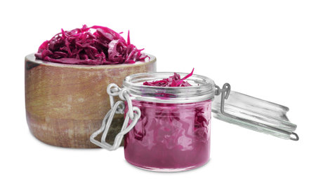 Bowl and jar with tasty red cabbage sauerkraut isolated on whiteの写真素材