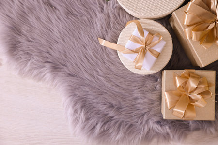 Christmas gift boxes on floor, flat lay. Space for textの写真素材