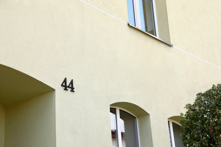 house number 44 on beautiful building outdoorsの写真素材