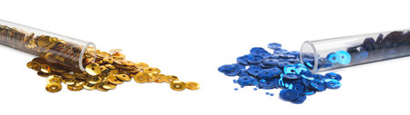 Tubes with shiny blue and yellow sequins on white backgroundの写真素材