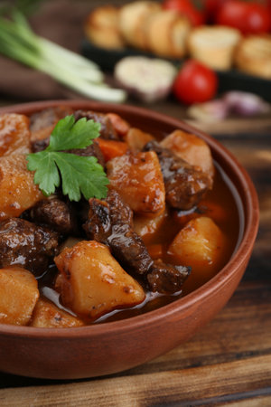 Delicious beef stew with carrots, parsley and potatoes, closeupの写真素材