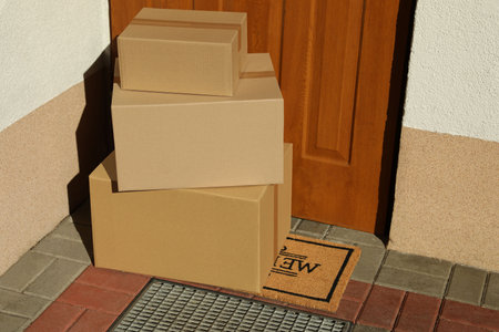 Parcels delivered on mat near front door