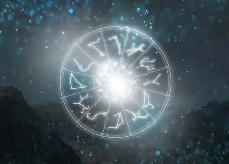 Zodiac wheel with 12 astrological signs and star constellations and mountain landscape on backgroundの写真素材