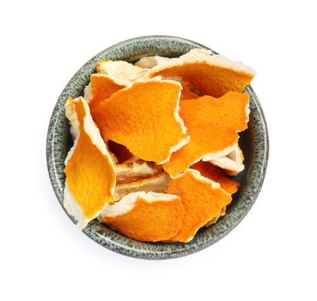 Dry orange peels in bowl isolated on white, top viewの写真素材
