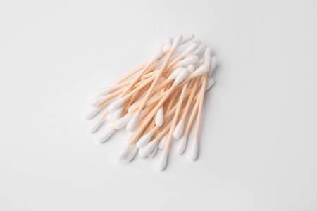 Pile of clean cotton buds isolated on white, top viewの写真素材