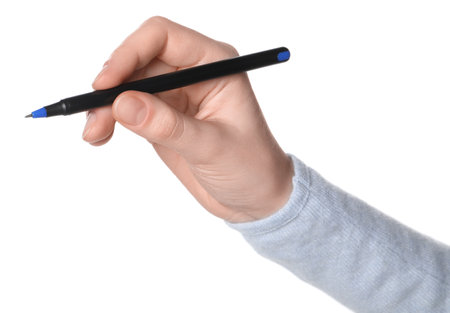 Woman holding pen on white background, closeup of handの写真素材