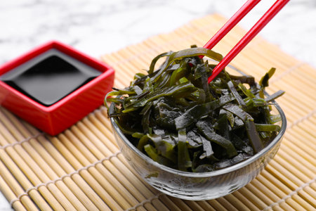 Fresh laminaria (kelp) seaweed served on table