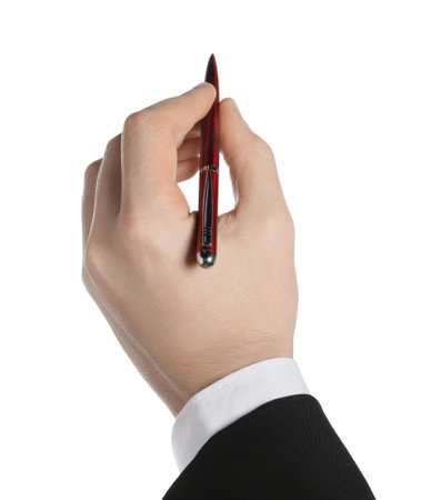 Businessman holding pen on white background, closeup of handの写真素材
