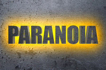 Mental disorder. Illuminated word Paranoia on gray stone backgroundの写真素材