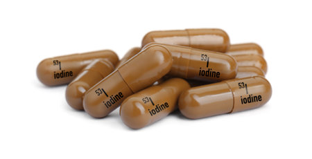 Pile of iodine pills isolated on whiteの写真素材