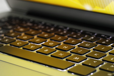 Close up view of modern laptop keyboard as backgroundの写真素材