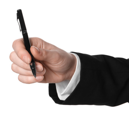 Woman holding pen on white background, closeup of handの写真素材