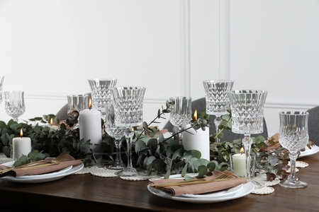 Stylish elegant table setting for festive dinner indoors