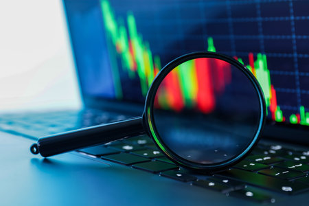 Magnifying glass on keyboard of laptop, closeupの写真素材