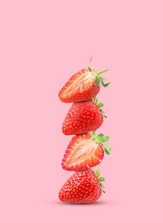 Stack of fresh strawberries on pink backgroundの写真素材