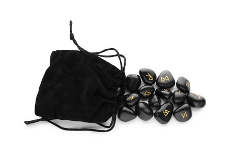 Bag with many black rune stones isolated on white, top viewの写真素材