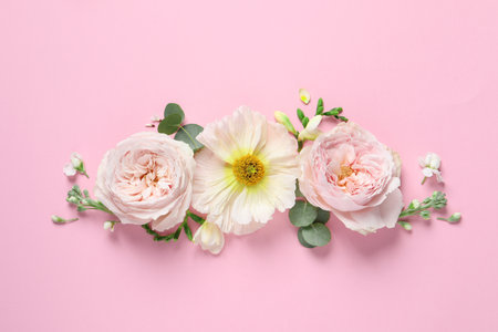 Different beautiful flowers on pink background, flat layの写真素材