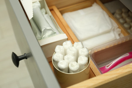 Storage of different feminine hygiene products in drawer, closeupの写真素材