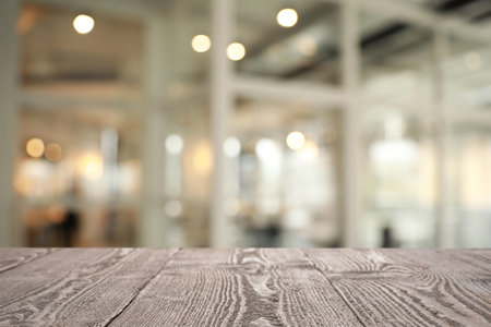 Empty wooden table in hall. Space for designの写真素材