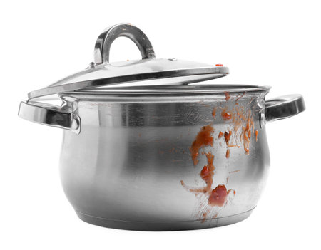 Dirty pot with lid on white backgroundの写真素材