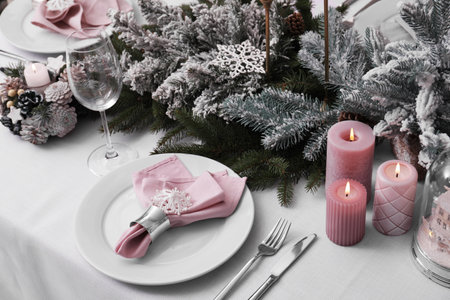 Beautiful festive table setting with Christmas decorの写真素材