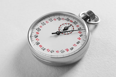 Vintage timer on light gray background. Measuring toolの写真素材
