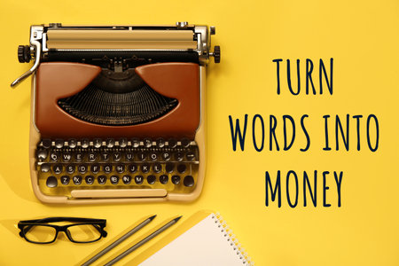 Phrase Turn Words Into Money near typewriter, glasses and stationery on yellow background, flat layの写真素材