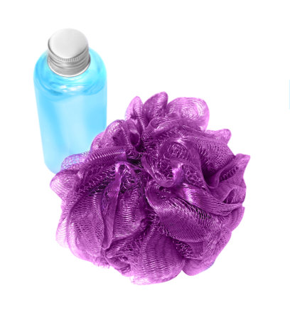 New purple shower puff and bottle of cosmetic product on white backgroundの写真素材