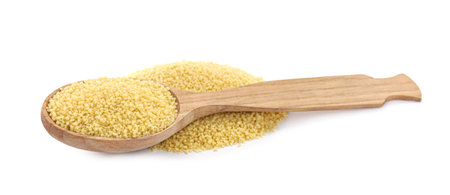 Wooden spoon with raw couscous on white backgroundの写真素材