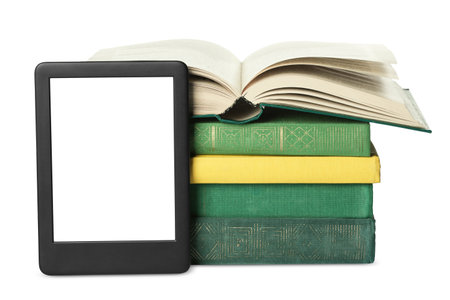 Modern e-book and stack of hardcover books isolated on whiteの写真素材