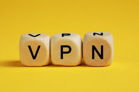 Wooden beads with acronym VPN on yellow backgroundの写真素材