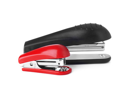 New bright color staplers isolated on whiteの写真素材