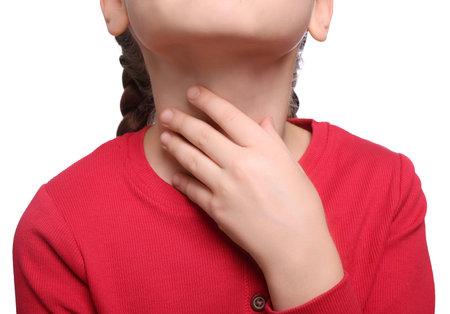 Girl suffering from sore throat on white background, closeupの写真素材