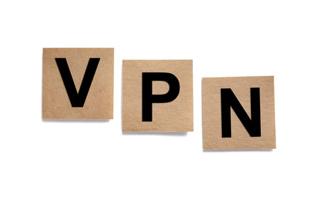 Paper notes with acronym VPN (Virtual Private Network) isolated on white, top viewの写真素材