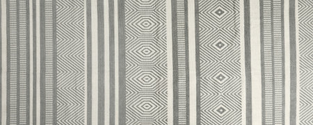 Texture of beautiful carpet with geometric pattern as background, closeup. Banner design