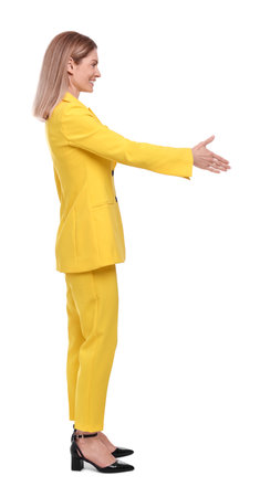 Beautiful happy businesswoman offering handshake on white backgroundの写真素材