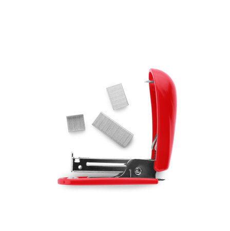 Bright red stapler with staples isolated on white, top viewの写真素材