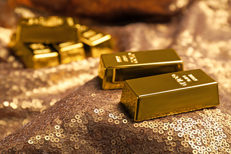 Shiny gold bars on bronze sequin fabric, closeup. Space for text
