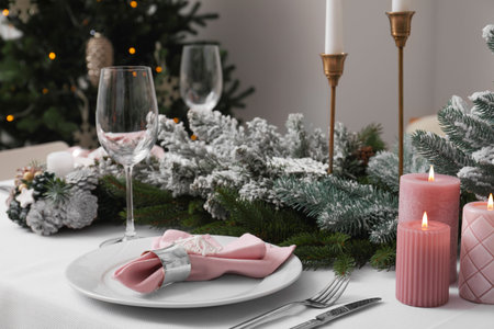 Beautiful table setting with Christmas decor indoorsの写真素材